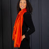 Luxuriously soft merino and silk shawl in paprika twill weave with a soft fine fringe generous size light and airy beautifully warm best-quality By The Wool Company