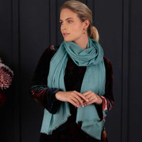 Luxuriously soft merino and silk shawl in duck egg green twill weave with a soft fine fringe generous size light and airy beautifully warm best-quality