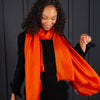 Luxuriously soft merino and silk shawl in paprika twill weave with a soft fine fringe generous size light and airy beautifully warm best-quality