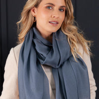 Luxuriously soft merino and silk shawl in storm cloud blue grey twill weave with a soft fine fringe generous size light and airy beautifully warm best-quality