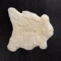 Undyed Ivory coloured sheepskin, dense, silky fleece, comfortable and supportive. Quality British skin from The Wool Company