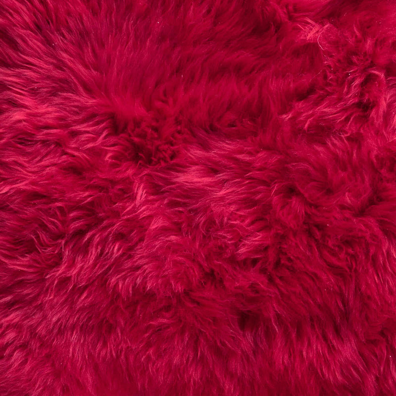 Bright rich Christmas red coloured sheepskin Soft and silky, thick and dense luxurious longwool fleece. Stunning vibrant skin