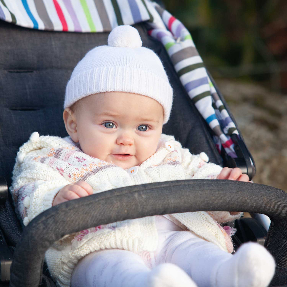 100% cashmere ivory knitted beanie pom-pom hat super-soft & luxurious made in Scotland top-quality warm & cosy ribbed hem