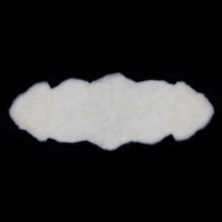 British double sheepskin in natural, off-white colour. Silky soft made from two sheepskins sewn together. Luxurious and thick