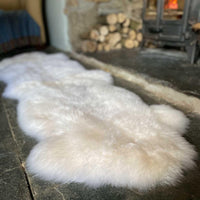 British double sheepskin in natural white Silky soft made from two skins sewn together. Luxurious & thick By The Wool Company