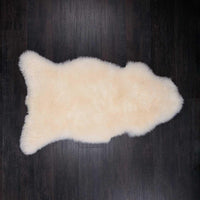 Beautifully soft, natural white undyed sheepskin thick and luxurious. Fleece length varies between rugs and the seasons. 