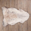 Undyed, shorn Icelandic sheepskin, greys, and browns flecked through a natural white soft fleece, From The Wool Company 