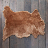 Soft, luxurious sheepskin throw in warm light brown tones would look fab in any interior shorn fleece dense & supportive