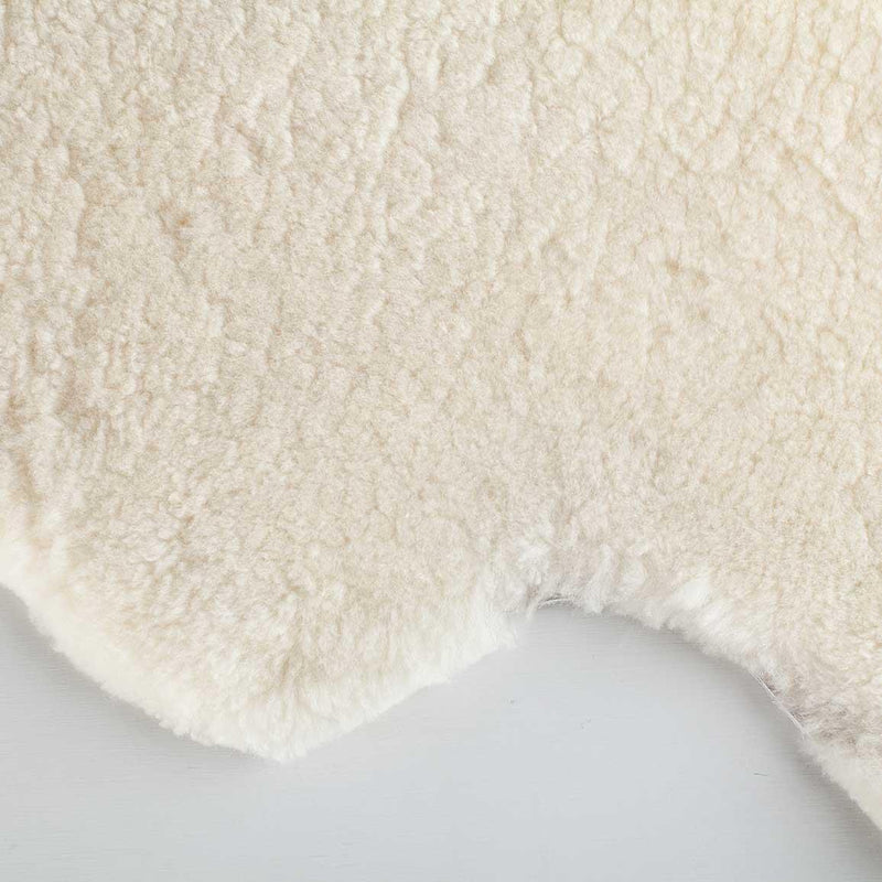 Extra-large sheepskin throw in natural creamy tones would look fab in any interior, shorn, undyed fleece, soft and supportive