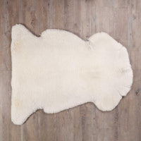 Extra-large sheepskin throw in natural creamy tones would look fab in any interior, shorn, undyed fleece, soft and supportive