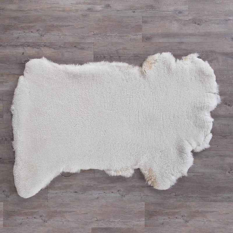 Extra-large sheepskin throw in natural creamy tones would look fab in any interior, shorn, undyed fleece, soft and supportive