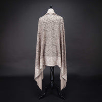 Hand-crafted 100% baby cashmere pashmina embroidered with black & white thread on a neutral background finest-quality