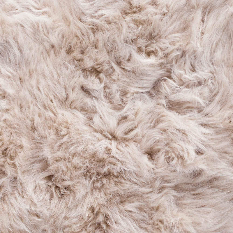 Dark cream honey coloured sheepskin. Soft and silky, thick and dense - the same colour as set honey, Quality real sheepskin