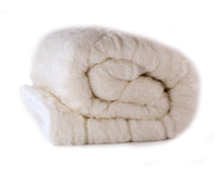 Reversible mattress topper with Merino wool pile with a luxurious lambswool filling.  super-soft, high-quality cotton cover 