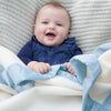 100% super-soft British-made off-white Merino wool classic soft blue satin bound baby blanket cosy & perfect for all seasons