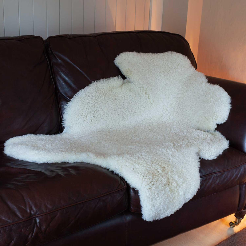 Very large natural, undyed creamy white Merino sheepskin, shorn down to 25mm, dense, supportive, and soft. 