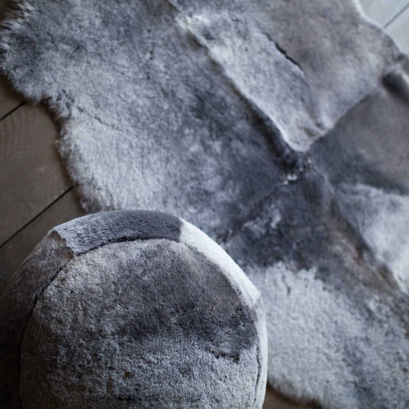 Genuine British sheepskin pouffe, super-soft, thick,& luxurious shorn fleece in silver graphite grey colourway top quality