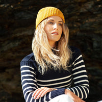 100% super-soft Merino wool classic fine-rib knitted beanie hat in a flecked rich mustard yellow made in England top-quality 