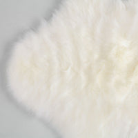 Extremely soft, luxurious, & beautiful to touch ivory white baby sheepskin, carefully selected for a naturally short fleece 